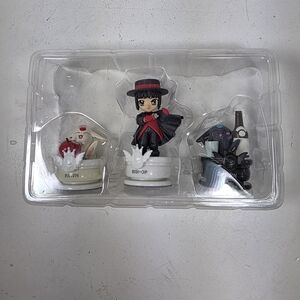 Chess Piece Figurine Set with Red and Black Accents